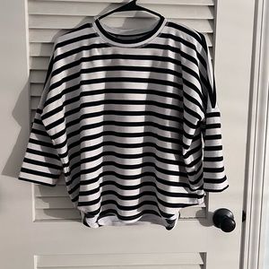 Tuckernuck striped shirt. Navy blue and white.  Tag cut out size medium.
